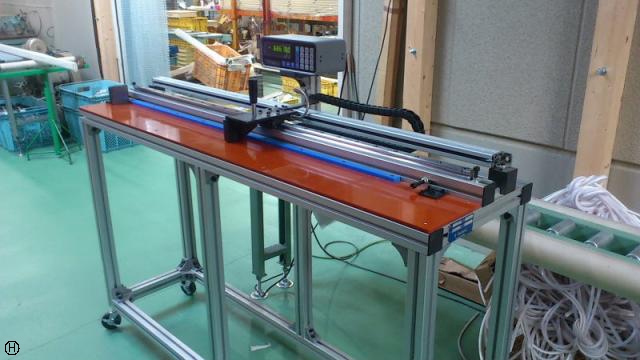  アルミ材長さ測定機